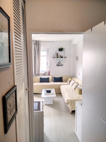 entrée avec lits superposés et machine à laver