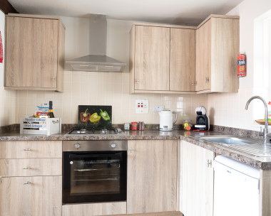 Well Equipped Kitchen leading to Dining Area