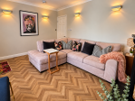 Super welcoming lounge with corner sofa, which transforms into a comfortable sofa bed