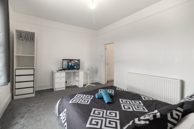 Bedroom view with TV