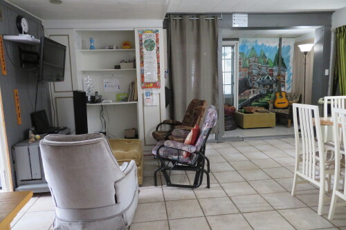 Living room with kitchen and cctv
