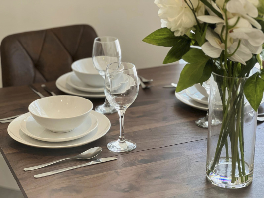 Modern dining area offering the perfect setting for breakfast, lunch, or dinner.