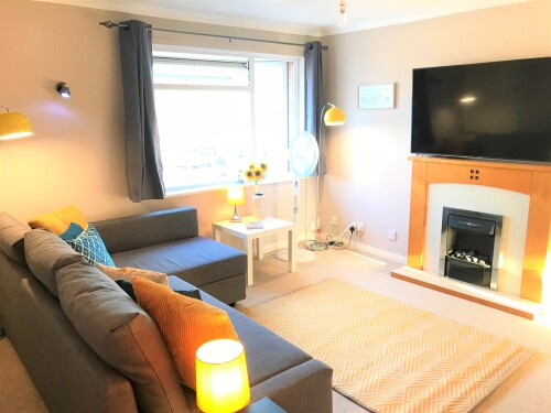 Toronto Apartment in Seaside Town with Parking - TV and Sofa
