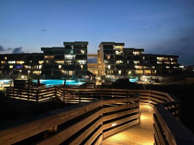 Enjoy the beach even at night (well lit walkway)