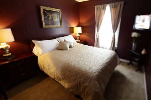 The Twilight Lodge, located in the enchanting mountaintop hamlet of Haines Falls, has six rooms and suites, of which no two are alike.  There are five double rooms and one single occupancy room; the lodge can accommodate up to eleven individuals.  Furnishings draw from a wide range of cultural influences and rooms are decorated with an eclectic mix of art and antiques from the innkeeper's onsite shop, Barbara's Art, Antiques and Collectibles Shop. Modern technology compliments The Twilight Lodge's old-world charm. Rooms feature flat screen televisions and complimentary wireless internet.