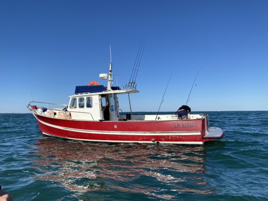 balade en mer, rencontre avec un pêcheur