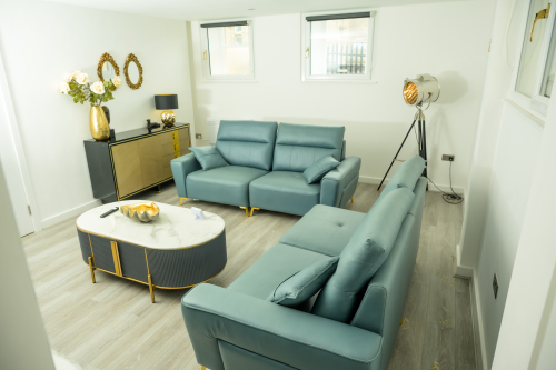 Relax in this comfortable living room, perfect for unwinding after a busy day.