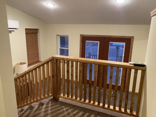 Stairs to private bedroom and sitting area
