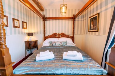 the magnificent 4 poster in the master bedroom