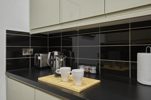  Stylish kitchen featuring modern appliances.