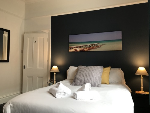 Bedroom One - Spacious and relaxing space to unwind and rest