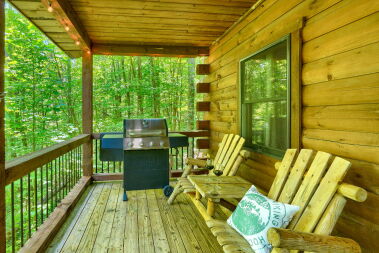 Outdoor deck with seating and propane grill