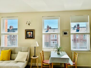This bright dining nook is part of the open-plan living space.