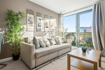 Living room and access to balcony
