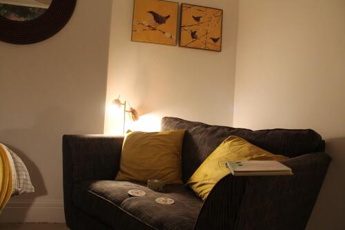 Bedroom 2 - curl up on the bedroom sofa and enjoy a good book