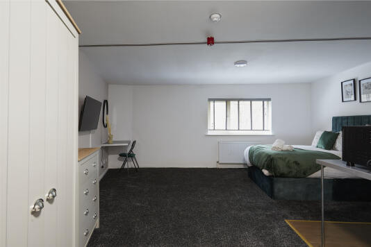 Sleep Peacefully in This Cozy, Hotel-Quality Bedroom