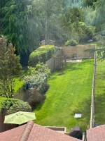 Woodside Cottage - view from loft bedroom to 100m garden and woodland beyond