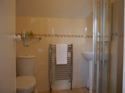 Spotlessly Clean with Towels, Soaps, & Shower Gel Provided at Eastfield Lodge.
