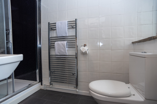Walk in shower provided, with complimentary shower gel, shampoo and conditioner provided, along with crisp fresh white towels per person