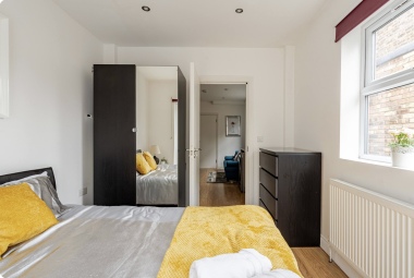 Bedroom  view through to lounge 