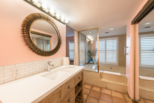 Shower/tub combo (jets/blower does not work) we have added a curtain for some privacy between bed and bath