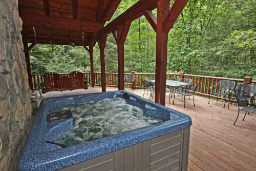 Back Deck, looking south, with Hot Tub, Swing and Outdoor Tables