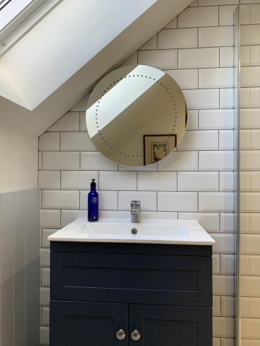 Vanity sink and heated mirror