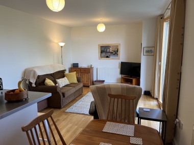 Living room with patio doors making it bright and airy 