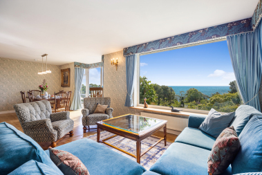 Spacious living/dining room with stunning sea views
