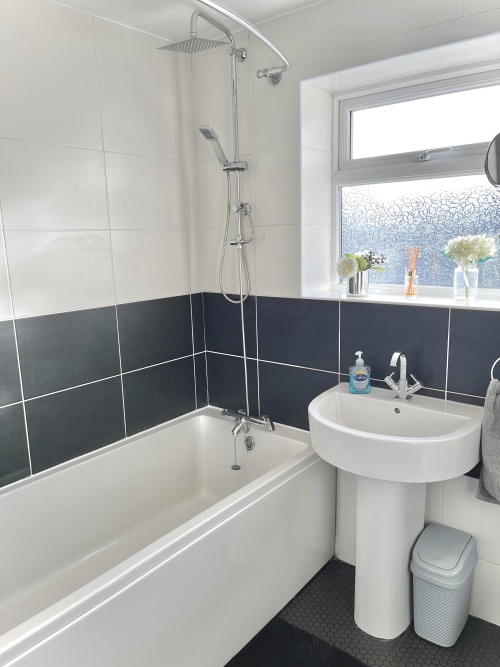 Bathroom - Modern bathroom with 3 piece suite and shower over the bath