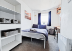 Bedroom 3: Double bed and ample storage