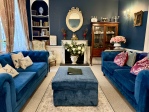 living room seating area and library