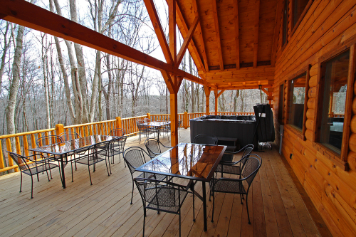 Outdoor Dining Area and Hot Tub1, looking toward woods