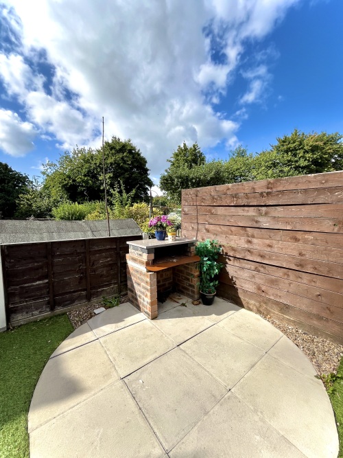 Charming patio corner ideal for morning coffee and outdoor vibes