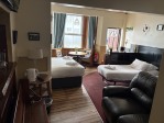 Spacious with 2 single beds and a double bed.