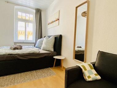  Bedroom with king-size bed and large wardrobe