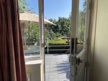 Bedroom looking to balcony