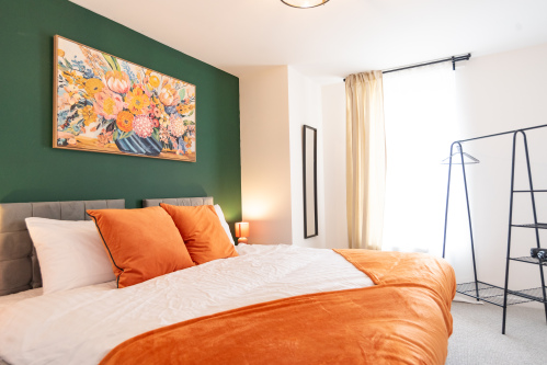 Comfortable bedroom with zip-and-link bed that can be arranged as a king or two singles.