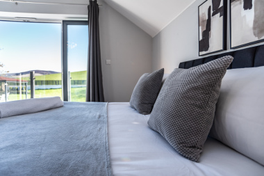 Master Bedroom with Double Doors and Balcony