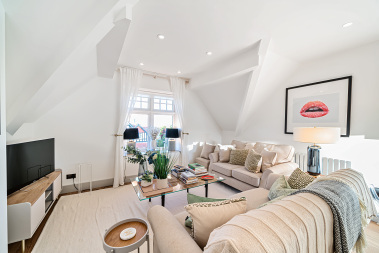 Comfortable luxury living room with TV for relaxing evenings.