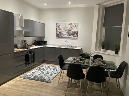 Relax Inn - Fully fitted kitchen with dishwasher, stove, oven, microwave and in a modern spacious layout with luxury fittings. 