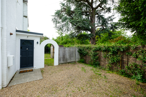 Free private parking area for guests' cars outside the front entrance to the property.