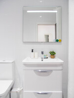 Bright bathroom with essential amenities for a comfortable stay