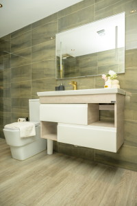 A fresh, well-maintained bathroom with essential amenities provided.