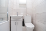 Private en suite with a clean, modern shower - offering ultimate flexibility and convenience for guests sharing the home.