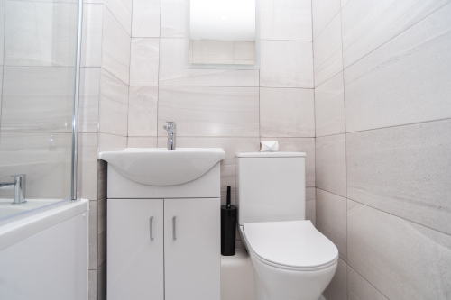 Private en suite with a clean, modern shower - offering ultimate flexibility and convenience for guests sharing the home.