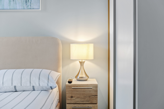 Comfortable bedding and lighting 