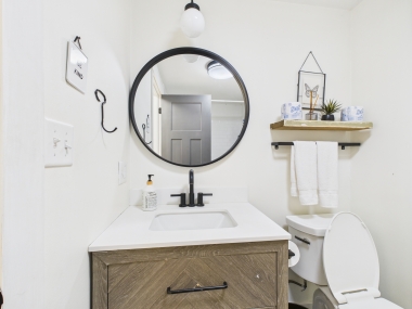 Bathroom two: matte black fixtures, clean lines, and a touch of spa-like elegance.