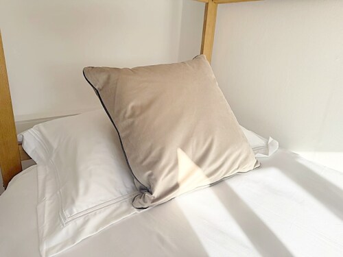 This charming bedroom features a cozy bunk bed, perfect for children. With vibrant décor and a playful atmosphere, it’s the ideal space for little ones to relax and recharge.