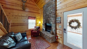 Way To Go Cabins - The Luxury Cabin at Cantwell Cliffs - Main floor fireplace room